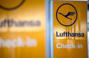 ep filed - 07 november 2019 lower saxony hanover a sign points to a lufthansa check-in counter at