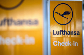 ep filed - 07 november 2019 lower saxony hanover a sign points to a lufthansa check-in counter at ep filed - 07 november 2019 lower saxony hanover a sign points to a lufthansa check-in counter at
