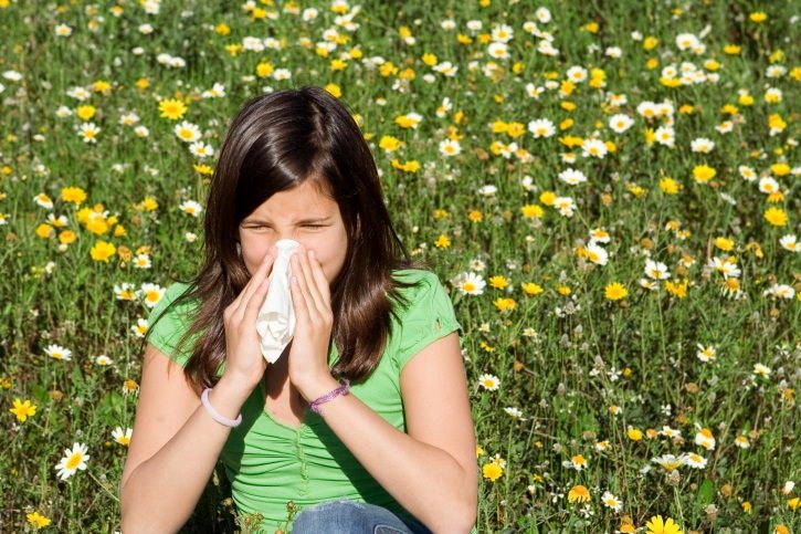 ep hayfever or allergy child blowing nose