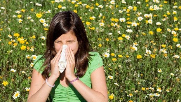 ep hayfever or allergy child blowing nose