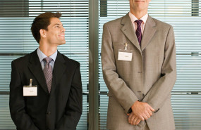 short height business men and tall men