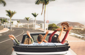 happy friends having fun in convertible car on vac 2022 02 25 22 55 18 utc 20231220191711 