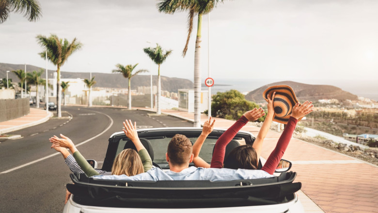 happy friends having fun in convertible car on vac 2022 02 25 22 55 18 utc 20231220191711 