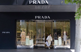 ep archivo   una mujer sale de una tienda de prada en la milla de oro de madrid a 3 de mayo de 2024