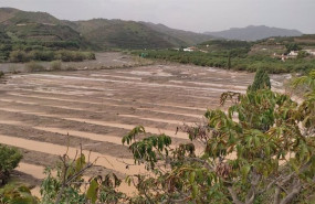 ep vista de campos de cultivo anegados en velez malaga tras el paso de la dana del 13 de noviembre