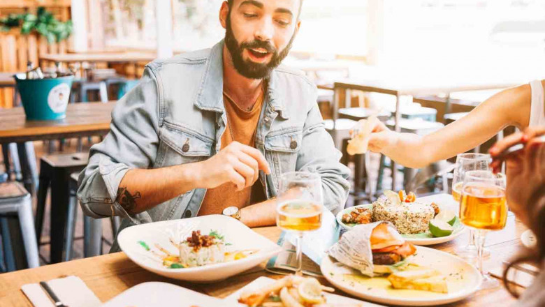 1638288748 man eating different dishes of food
