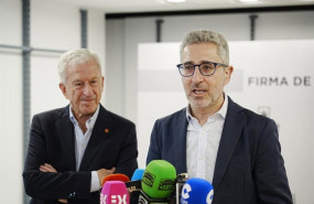 ep el ministro de hacienda arcadi espana junto al presidente de caritas espanola manuel breton antes