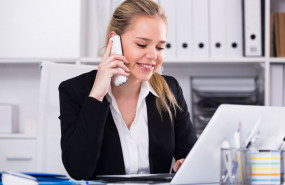 1624036292 woman talking phone office