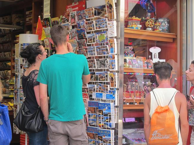 ep turistas compras ventas tienda souvenirs postales turismo