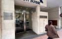 ep archivo   una mujer pasa junto a la entrada de la sede de credit suisse en madrid espana a 29 de