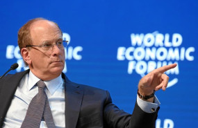 ep laurence fink chairman and chief executive officer blackrock usa points into the audience during
