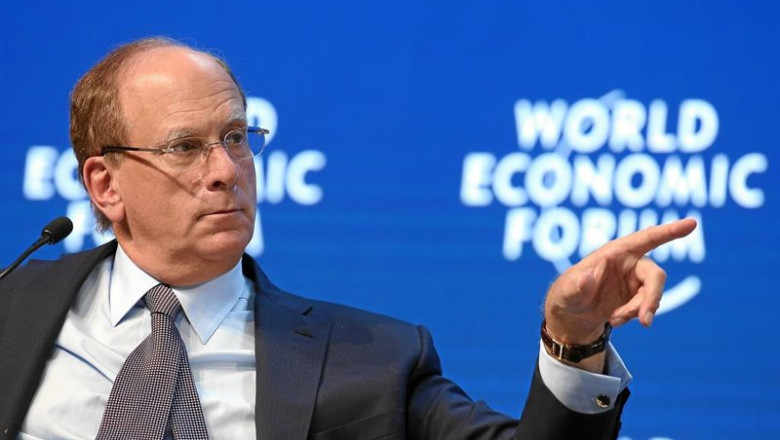 ep laurence fink chairman and chief executive officer blackrock usa points into the audience during