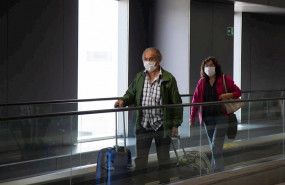 ep unos pasajeros con mascarillas en sao paulo