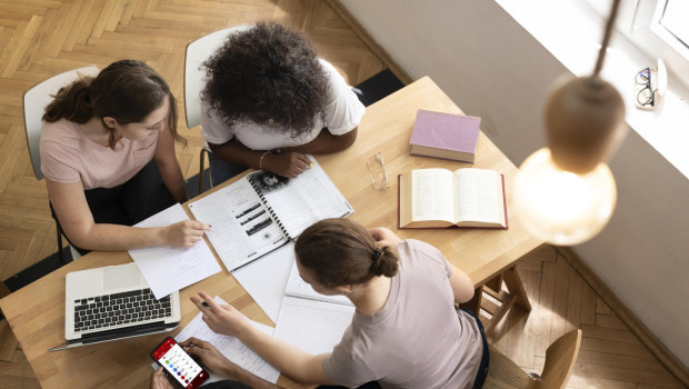 college girls studying together 