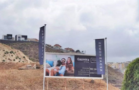 ep archivo   valla en la que se anuncia la primera promocion inmobiliaria de aedas homes en las