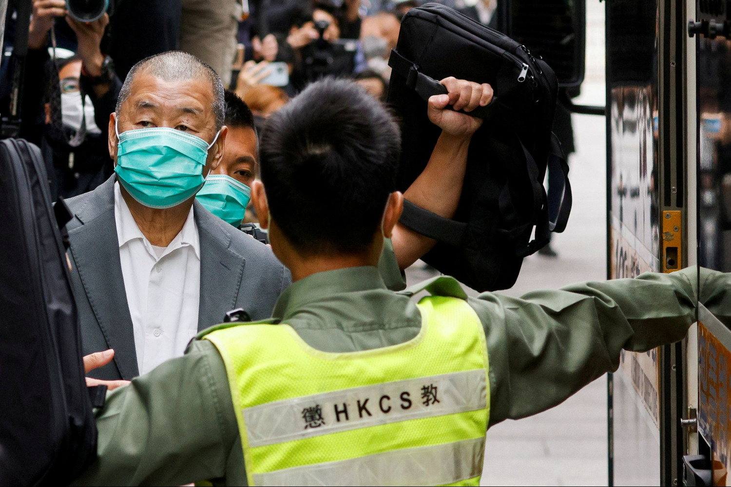 https://img3.s3wfg.com/web/img/images_uploaded/c/7/hong-kong-les-banquiers-de-jimmy-lai-menaces-de-prison-s-ils-s-occupent-de-ses-comptes_rsz.jpg