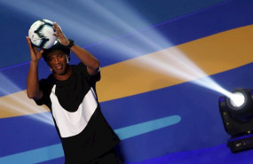 ep ronaldinho lifts a ball during a ceremony to draw the three groups of the upcoming 2019 copa