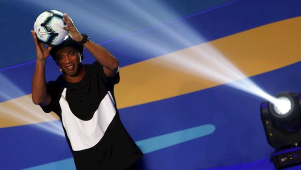 ep ronaldinho lifts a ball during a ceremony to draw the three groups of the upcoming 2019 copa