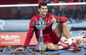 ep 06 october 2019 japan tokyo serbian tennis player novak djokovic celebrates with the trophy after