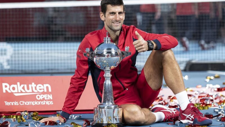 ep 06 october 2019 japan tokyo serbian tennis player novak djokovic celebrates with the trophy after